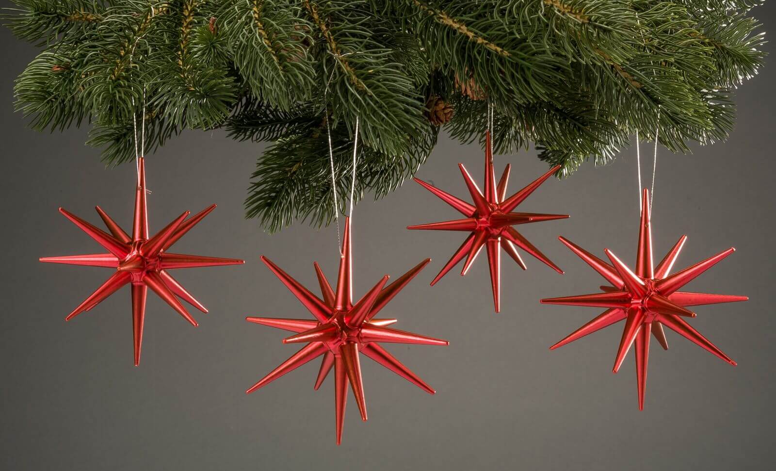 Weihnachtsbaumschmuck aus Holz, Weihnachtssterne rot-metallic, 4-teilig von Albin Preißler_Bild2